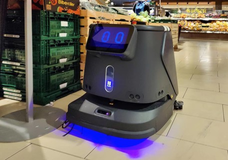 Cleaning robot in supermarket, Witten, North Rhine-Westphalia, Germany