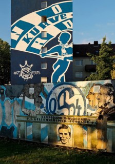 Painted wall on the Glückauf battle track with motifs of FC Schlake 04, Schalke, district of