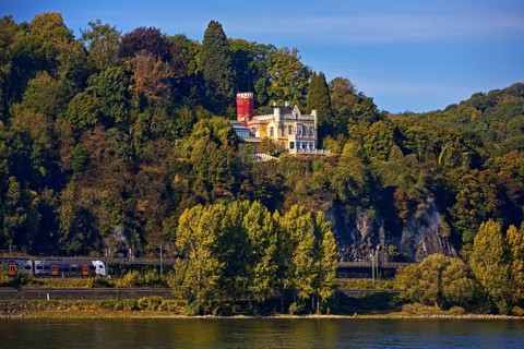 Marienfels Castle with Rhine and regional train from National Express Rhine, Remagen,