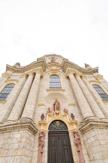 Majestic baroque church façade with tall columns and decorated entrance, ZFP Zwiefalten, Reutlingen