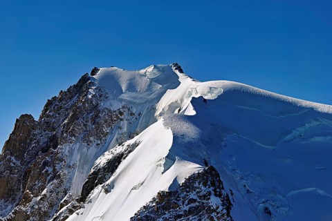 View of the snow-covered Mont Blanc du Tacul from the Aiguille du Midi, Chamonix-Mont-Blanc,