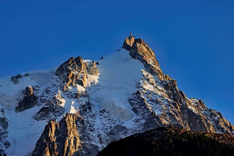 Snowy Aiguille du Midi in the evening light, Mont-Blanc, Chamonix-Mont-Blanc, Haute-Savoie, France