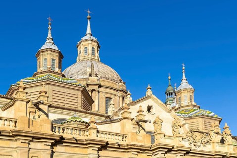Towers and domes on roof of Basilica of Our Lady of the Pillar cathedral church, Zaragoza, Aragon,