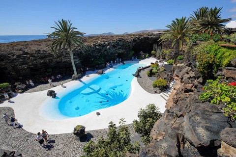 View from elevated position of pool designed by César Manrique Swimming pool in art venue cultural