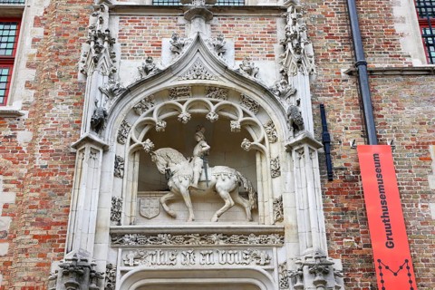 Gruuthusemuseum with equestrian statue of Lodewijk van Gruuthuse above the entrance portal in the