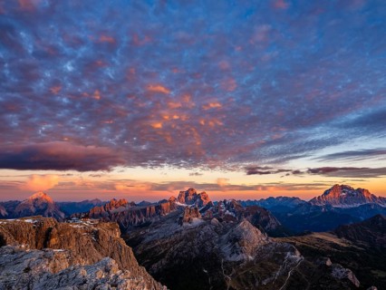 Alpenglühen, Rifugio Lagazuoi and rugged Dolomite peaks at sunset, Monte Pelmo in the middle,