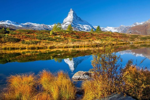 Matterhorn 4478 m with reflection in Leisee on the Sunnegga in autumn, Zermatt, Mattertal, Valais,