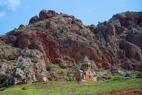 Lonely church in impressive rocky landscape under clear sky, Noravank monastery, Surb Astvatsatsin