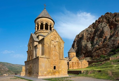 Stone church with dome in impressive mountain landscape, Noravank monastery, Surb Astvatsatsin