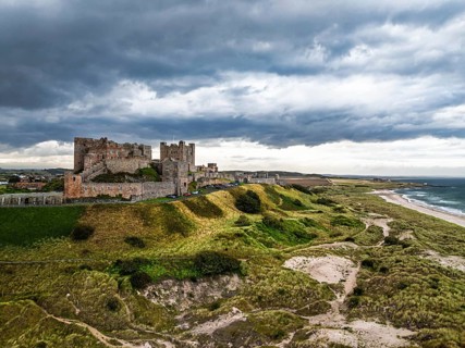 Bamburgh Castle from a drone, Northumberland, Northeast Coast, England, United Kingdom