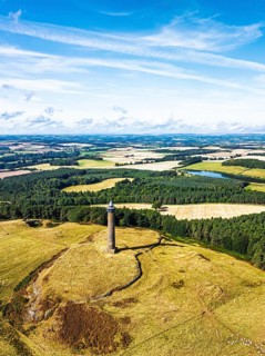 Waterloo Monument over Scottish fields and farms from a drone, Jedburgh, Scotland, UK