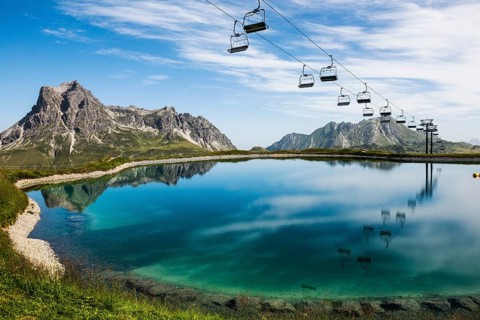 Mountain landscape with reservoir and chairlift, Saloberkopf, Widderstein, Warth, Bregenzerwald,