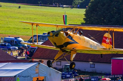 A biplane Bücker Bü 131 Jungmann with the registration HB-UUD during a flight demonstration as part