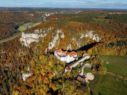 Aerial view of Wildenstein Castle near Leibertingen, surrounded by autumn vegetation, Upper Danube