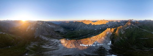 Sunrise 360° Alpine panorama, aerial view of Bachlenkenkopf, summit of the Großvenediger, Venediger