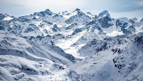 Mountain panorama with view of peaks of the Bernina Group, view from Piz Grialetsch in winter,