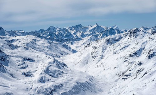 View of mountain panorama with mountain peaks of the Bernina Group, mountain landscape in winter,
