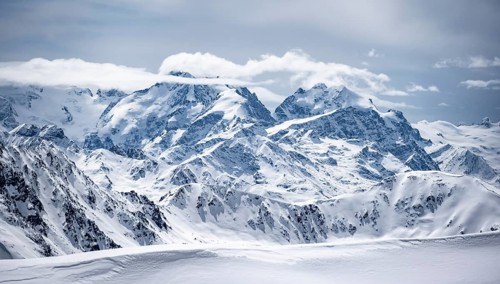 View of mountain panorama with mountain peaks of the Bernina Group, mountain scenery in winter,