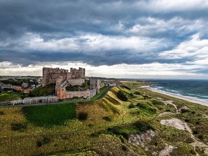 Bamburgh Castle from a drone, Northumberland, Northeast Coast, England, United Kingdom