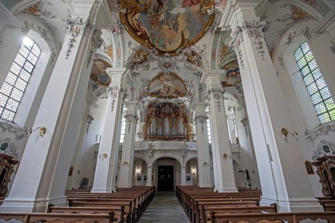 St. George and James Catholic Church, interior view, nave with ceiling frescoes and organ, Isny,