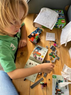 Child, boy, 7 years, blonde, playing with Lego, building kit, Stuttgart, Baden-Württemberg, Germany