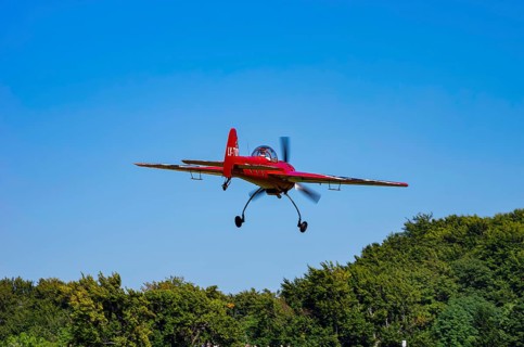 A Soviet Jakovlev Jak-55 sport aircraft with the registration LY-TOY during a flight demonstration