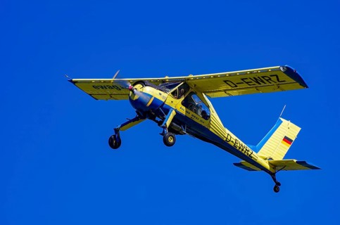 A PZL-104 Wilga-35A sport aircraft from Fliegerklub Kamenz with registration D-EWRZ during a flight