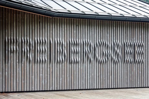 Wooden slats on a building on Freibergsee, Oberstdorf, Oberallgäu, Allgäu, Bavaria, Germany