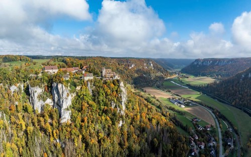 Aerial view, panorama of Werenwag castle and former castle on a rocky spur in the upper Danube