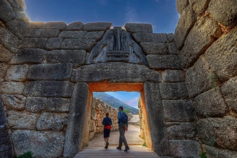 HDR, sky changed, couple walking through a huge stone gate, lion gate, Mycenae, archaeological