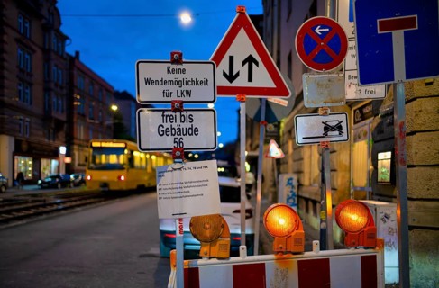 Sign forest, several traffic signs, construction site, stopping ban, dead end, oncoming traffic,