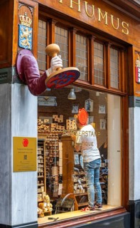 The Posthumus Shop, stationery boutique, shop façade with decorative stamp motifs, St. Luciensteeg,