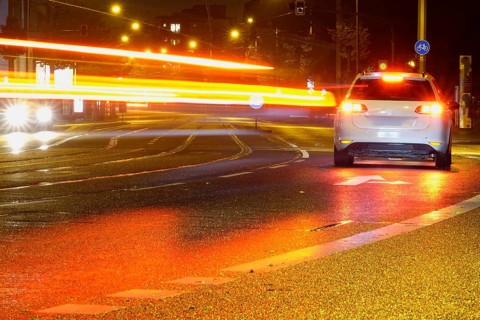 Road traffic at night and poor visibility in a city, autumn, Germany
