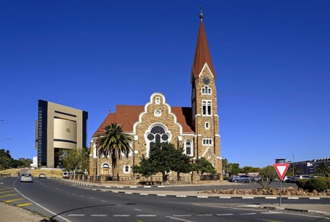 Evangelical Lutheran Christ Church from 1910, in the background the Independence Museum, Windhoek,