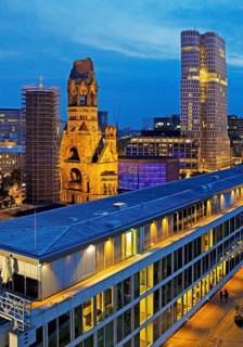 Bikini Berlin with Kaiser Wilhelm Memorial Church from an elevated position in the evening,