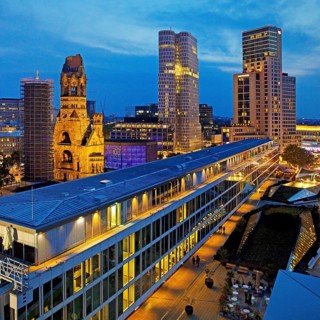 Bikini Berlin with Kaiser Wilhelm Memorial Church from an elevated position in the evening,