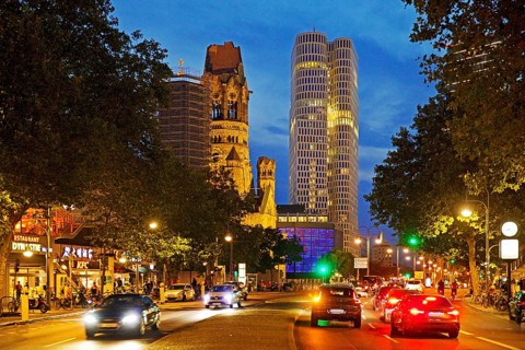 Budapester Straße with Kaiser Wilhelm Memorial Church and Upper West Tower in the evening,