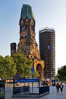 Kaiser Wilhelm Memorial Church with Kurfürstendamm subway stop, Berlin, Germany