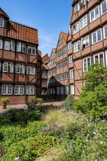 Facades of the historic brick buildings, inner courtyard, view over the city, Peterstraße,