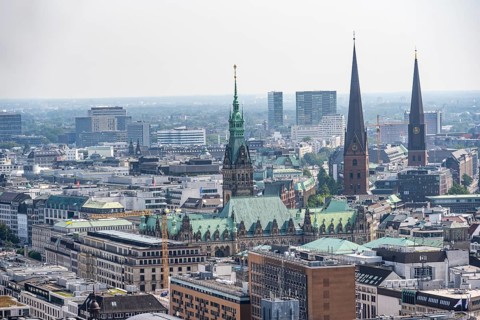 City view, view over the city with church towers and town hall tower, from the tower of St