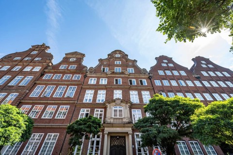 Facades of the historic brick buildings in Peterstraße, with Sonnenstern, Komponistenviertel,