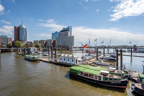 Boats at the city sports harbour in the Elbe, in the back Hafencity with Elbphilharmonie, Hamburg,