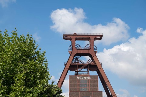 Double trestle headframe in front of a blue sky, Shaft XII, Zollverein Coal Mine Industrial
