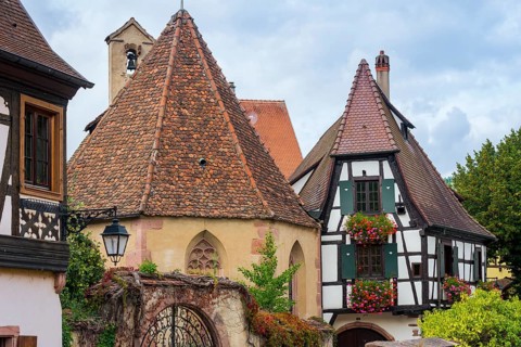 Picturesque Kaysersberg with half-timbered houses in the old town centre