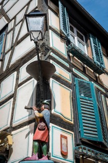The flute player, half-timbered house in the historic centre of Ribeauvillè