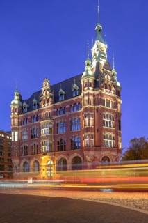 Speicherstadt town hall in Hamburg's Speicherstadt warehouse district at blue hour with traces of