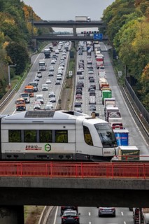 S-Bahn S28 crosses the A3 motorway between the Hilden junction and the Mettmann junction, view to