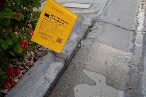 Las Vegas, Nevada - Water waste investigators patrol residential neighborhoods, issuing tickets for