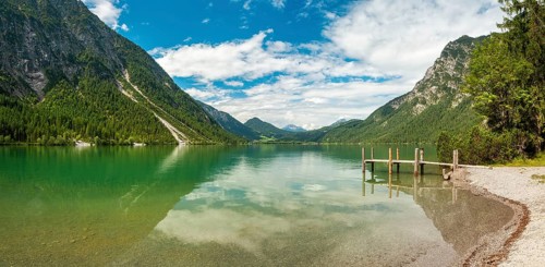 Jetty on Lake Heiterwanger See in the Ammergau Alps, Heiterwang near Reutte, Tyrol, Austria