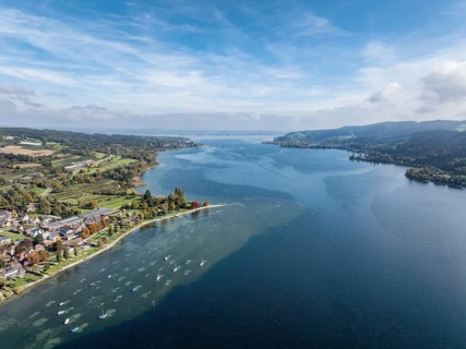 Aerial view of the village of Wangen on the Höri peninsula with boat moorings and jetty on the